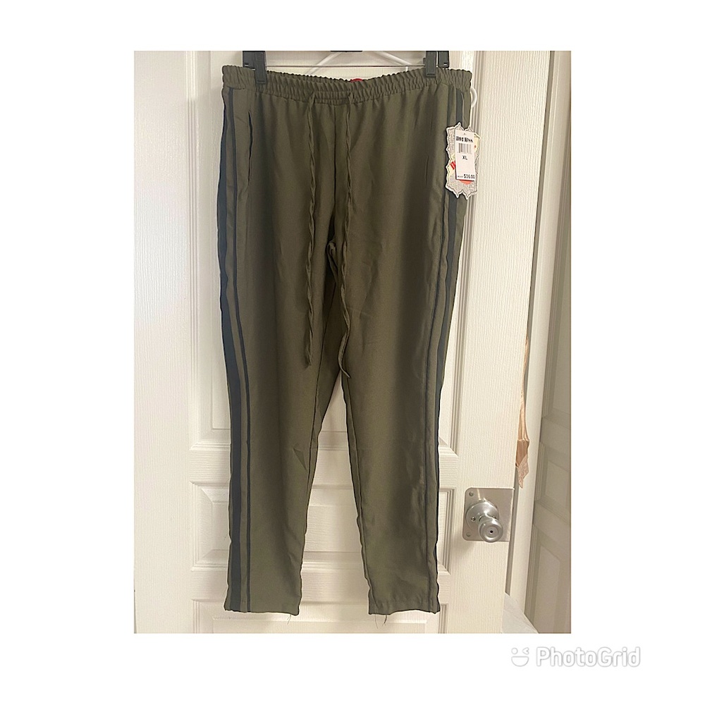 Army green pants with black lining down the side